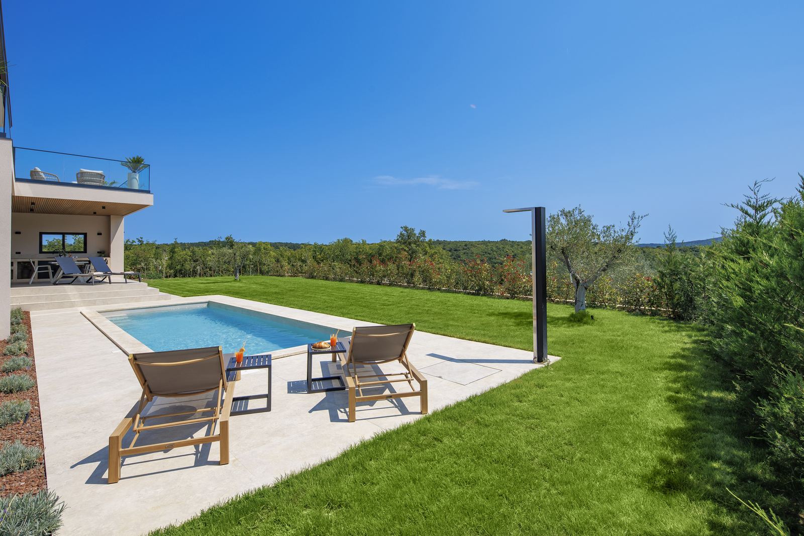 Private heated pool with sun loungers and garden