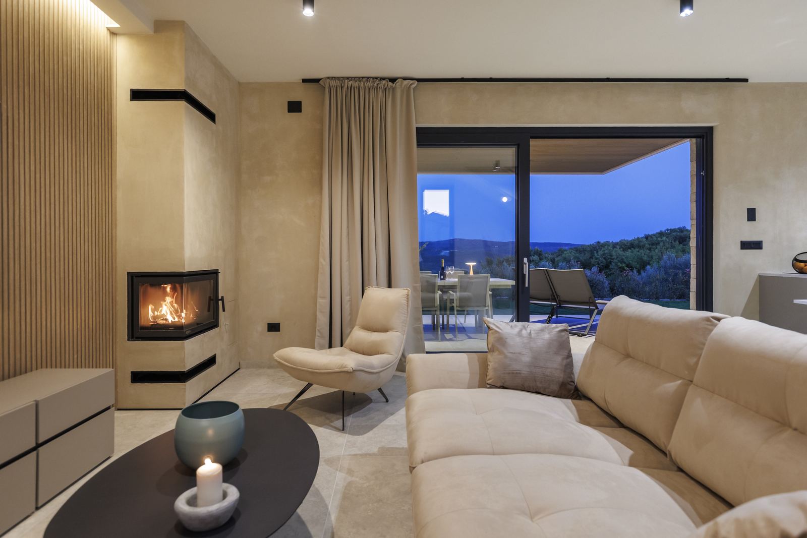 Living room with the fireplace lit