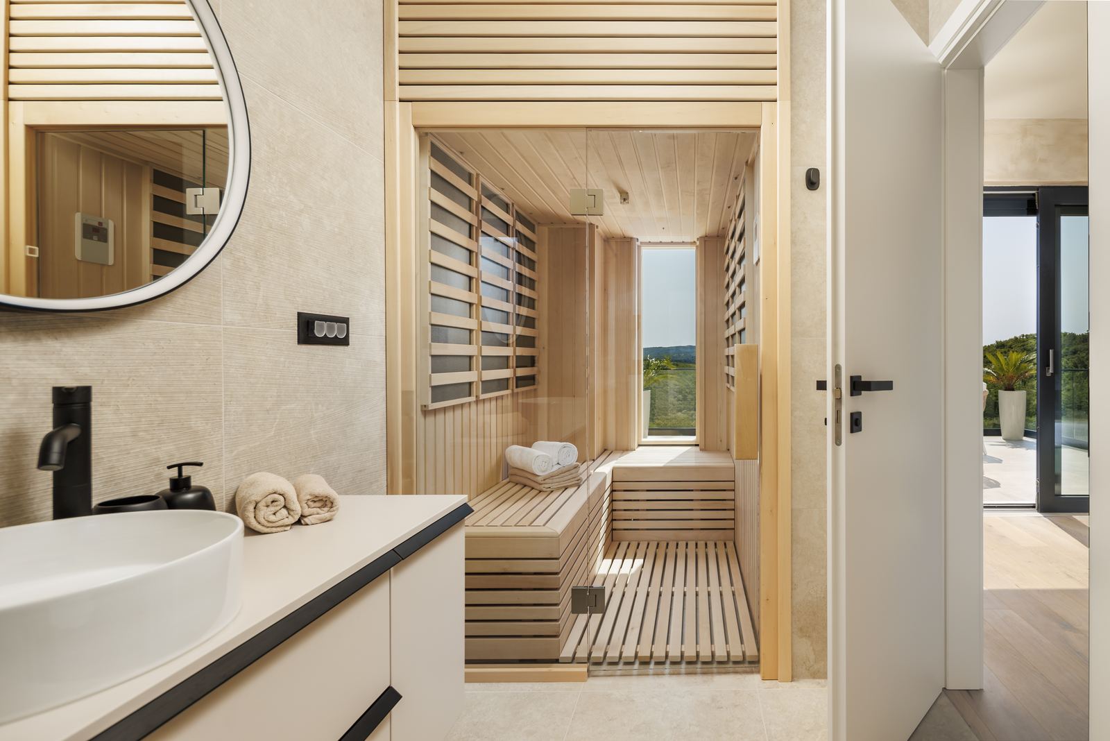 Bathroom and sauna in natural tones