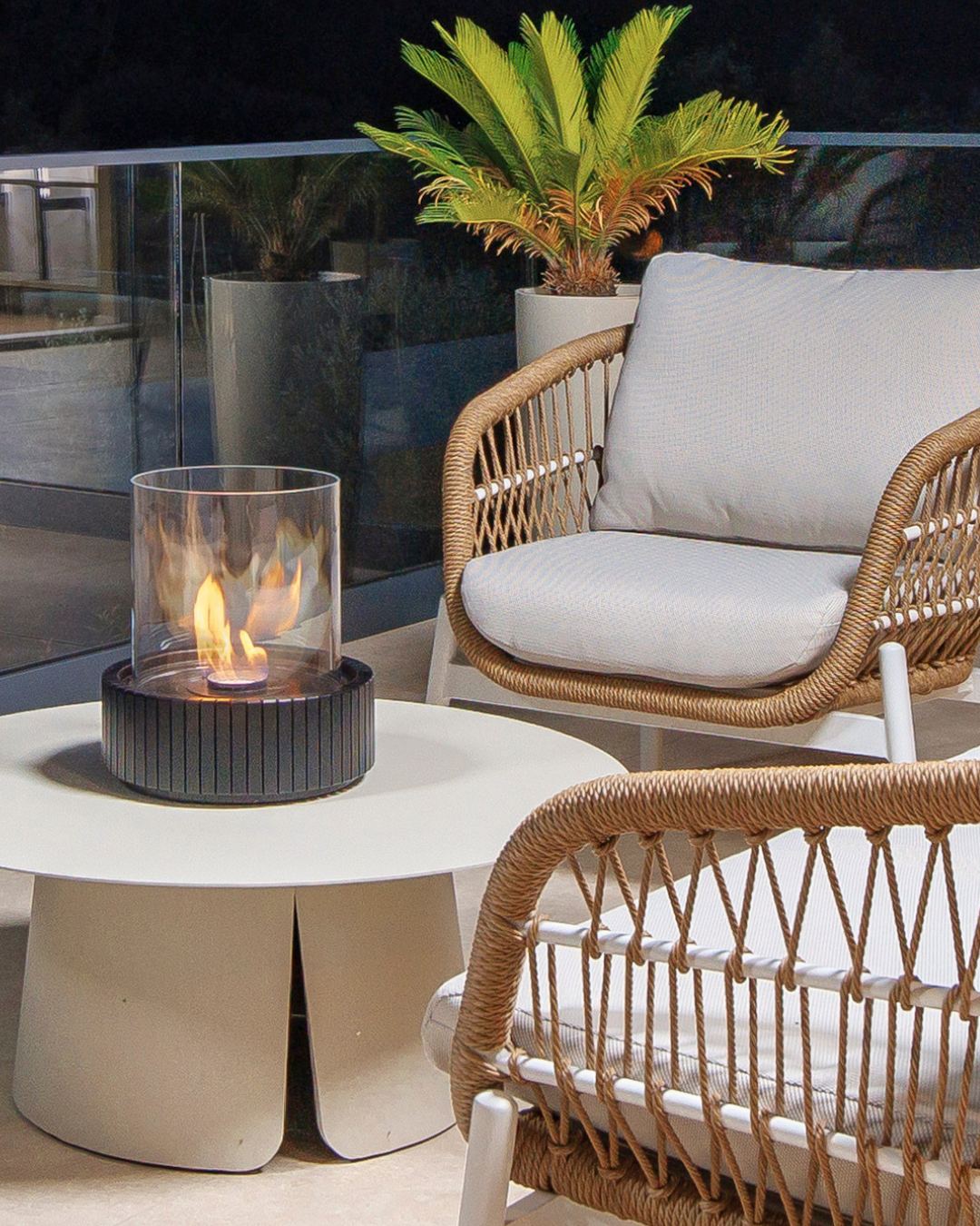 Terrace detail with lantern and armchairs