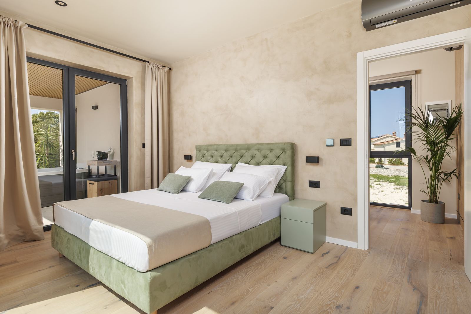 Bedroom with large windows